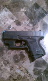 Glock 27 with Crimson Trace laser and Pearce Grip PG 26