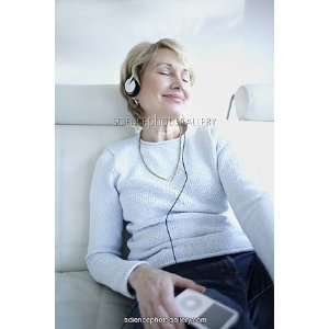  Woman listening to music Framed Prints