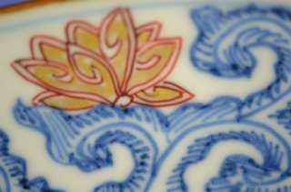 An almost 100% mint Chinese porcelain plate famille rose scroll with 