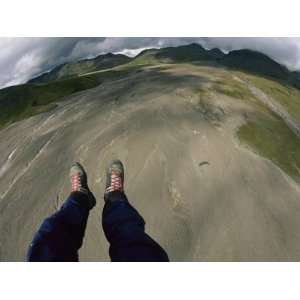 Motorized Paraglider over a Broad Outwash Plain Between Volcanoes near 