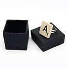 Scrapbooking, scrabble ring items in wooden puzzle 