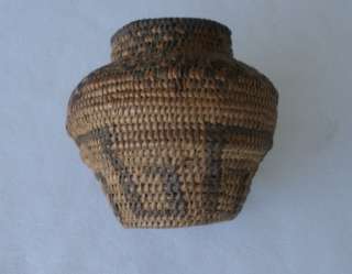   basket. In areas uneven stitching might be the work of a novice