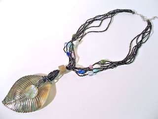   necklace features a large 3 1/2 x 2 1/2 leaf shaped abalone shell