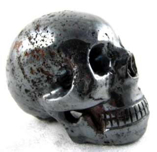 This gorgeous crystal skull measures 2.75 inches front to back.