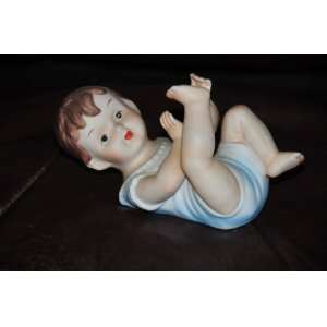  Vintage Laying on back Bisque Porcelain Boy Baby Piano 