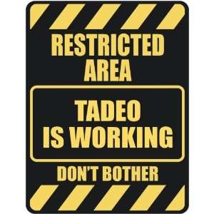   RESTRICTED AREA TADEO IS WORKING  PARKING SIGN