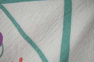There is quilting around and within the applique and in straight line 