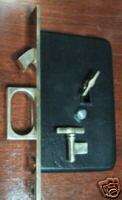bronzed keyed single locking pocket door lock  