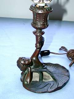 This auction is for a Antique Art Nouveau Bronze Lady With the Torch 