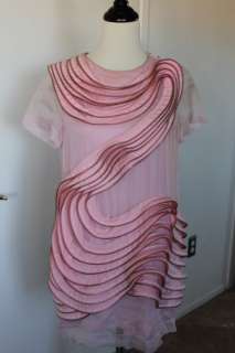   this dress is sold in departments stores size 2 material 100 % silk