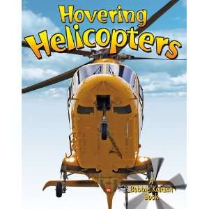 Hovering Helicopters (Vehicles on the Move) Molly Aloian 
