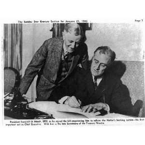  President Roosevelt,March 1933,signing the bill empowering 