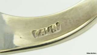 We guarantee this ring to be 14k gold and sterling silver as stamped 
