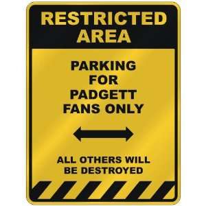 RESTRICTED AREA  PARKING FOR PADGETT FANS ONLY  PARKING 