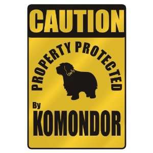  CAUTION  PROPERTY PROTECTED BY KOMONDOR  PARKING SIGN 