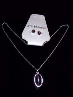   ensemble with this Silver With Purple Stone Necklace And Earring Set