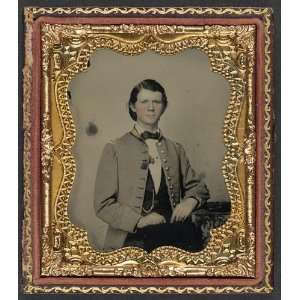   soldier in Confederate frock coat with gold trim
