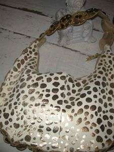 CHIC PRE OWNED CHARM AND LUCK GOLD SPOTTED LEATHER STUDDED PONY FUR 