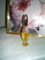 AVON TO A WILD ROSE MINUETTE BOTTLE NEARLY FULL  