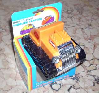 Vintage TUMBLING TRACTOR Battery Operated shell NIB   