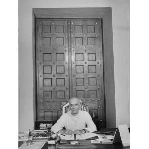  Pandit Jawaharlal Nehru Sitting Behind Desk in His Office 