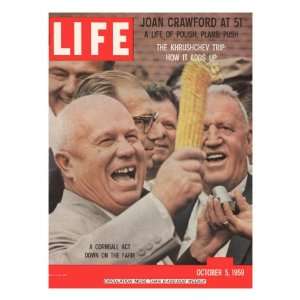 Russian Premier Nikita Khrushchev Holding Up Ear of Corn During Tour 