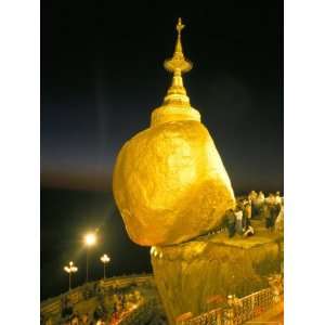 Balanced Rock Covered in Gold Leaf, Major Buddhist Stupa and Pilgrim 
