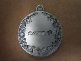 case ih 2006 christmas ornament featuring a horse drawn sleigh and a 