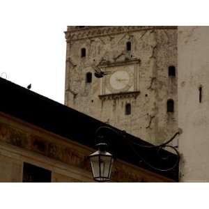 com Bird Soars Past the Clock Tower of Castello Della Regina in Asolo 