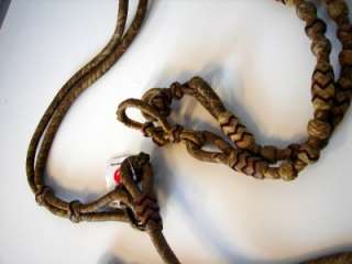 Up for Auction is a Pair of Romal Reins Leather Raw Hide braided.