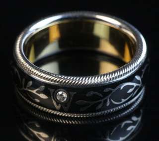   wellendorff hibiscus black spinning ceramic ring with diamond