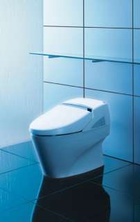 Sleek, tankless, low profile elongated one piece toilet with 
